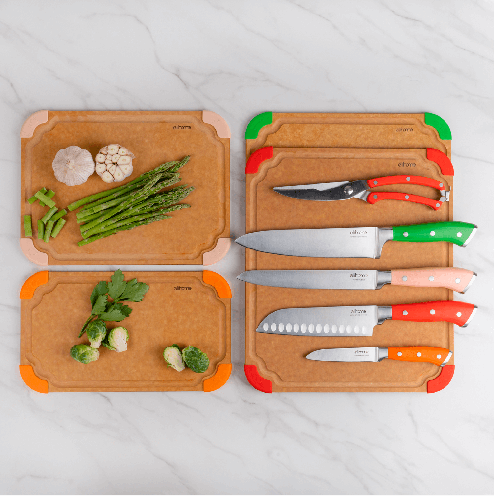 Elihome new arrival kitchen collection featuring wood fiber cutting boards with colorful silicone corners and premium knife set with poultry shears on marble background