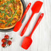 Elihome red silicone spatula and spoonula set displayed next to a fresh pizza. Features a bold, heat-resistant seamless design ideal for cooking and serving.