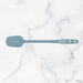 Blue spatula on a marble surface with 'elihome' branding.
