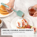 Person using a silicone spatula to serve pancakes with figs and yogurt, with text highlighting features.