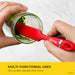 Red spatula with cartoon character being used to mix contents in a jar, with text highlighting multi-functional uses.