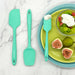 Elihome Tiffany Blue (Mint Green) silicone spatula set displayed with fresh figs and fruit salad. The mini spatula is shown serving yogurt, highlighting the refreshing color and versatile design.