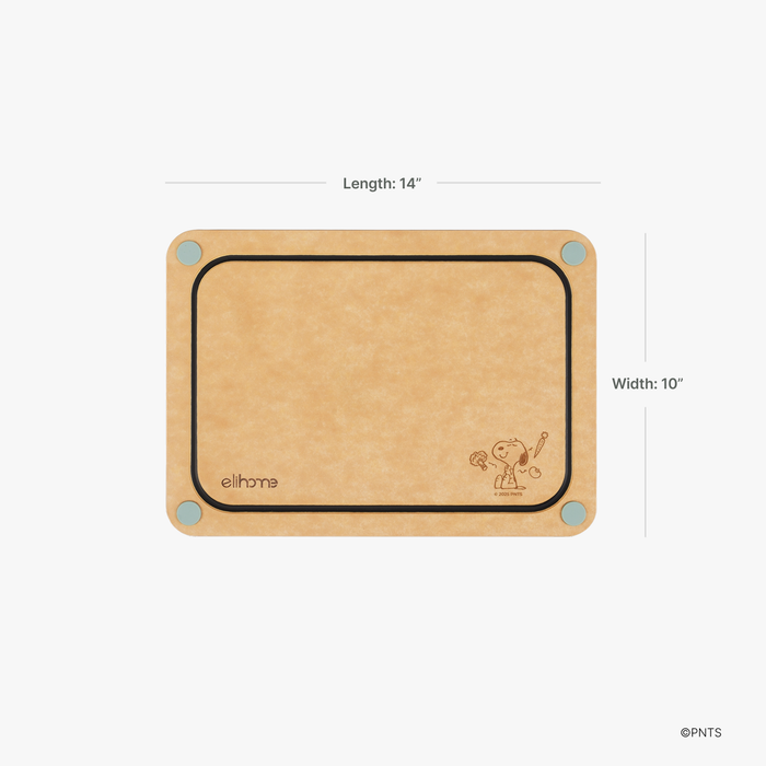 Elihome x Peanuts 4-in-1 cutting board measuring 14 inches long by 10 inches wide, with color-coded corner feet and engraved Snoopy artwork