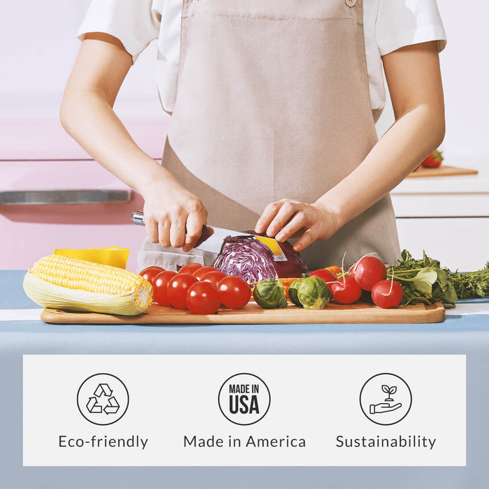 A chef slicing fresh vegetables on an eco-friendly cutting board, featuring icons highlighting sustainability and Made in America manufacturing.